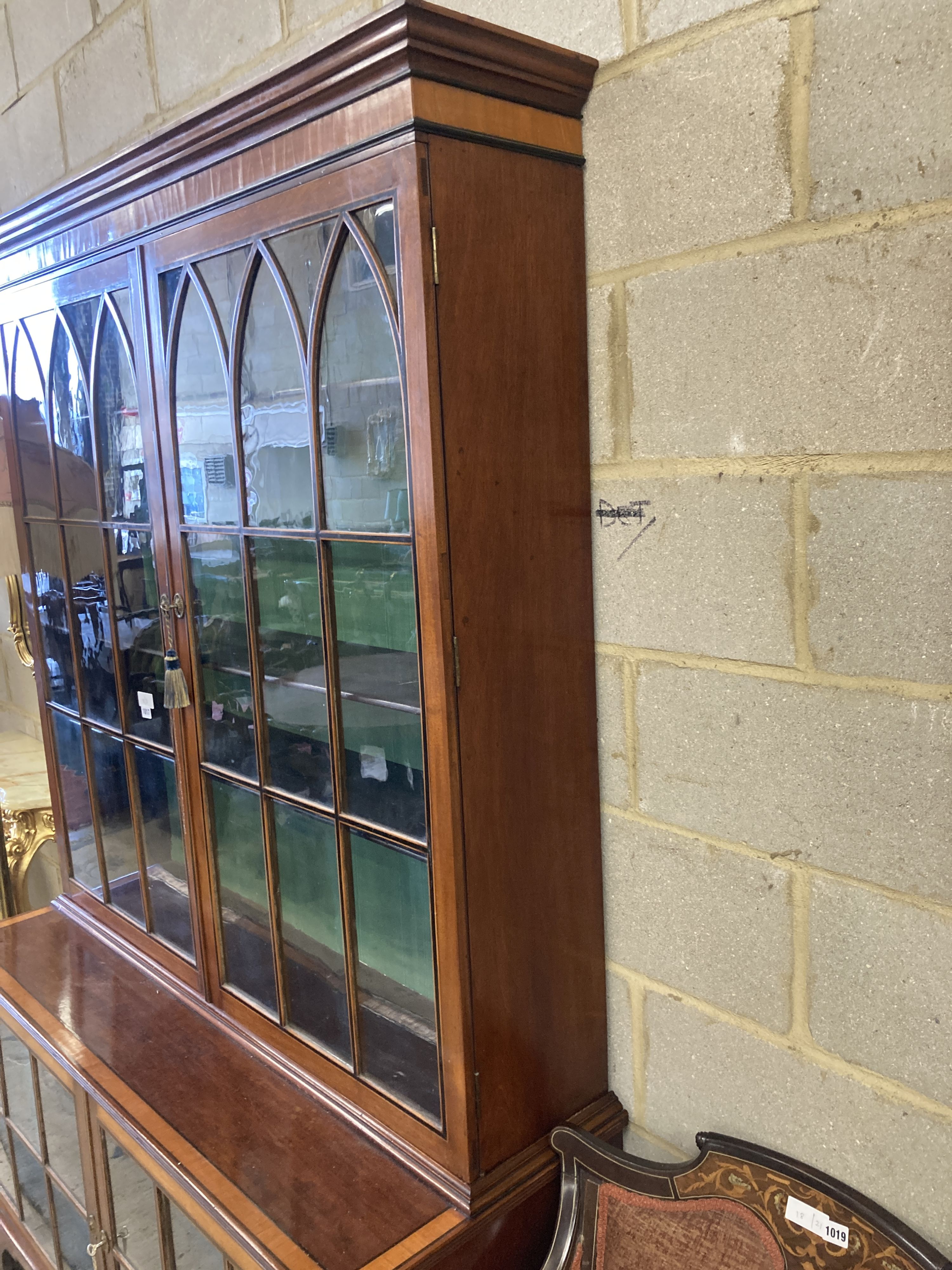 A George III style satinwood and ebony banded mahogany display cabinet, width 132cm, depth 50cm, height 208cm